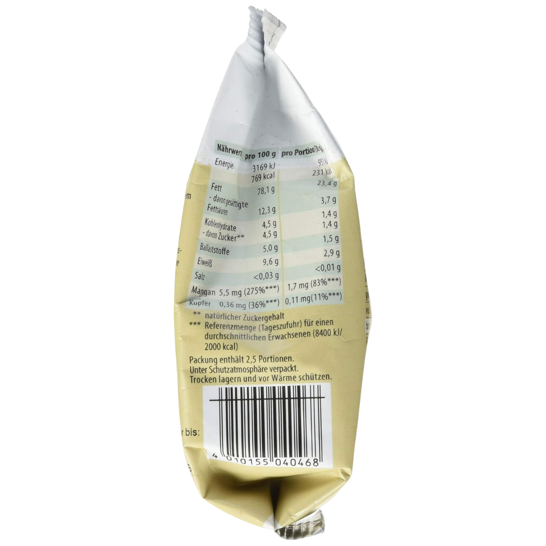 Nährwertangaben der Reformhaus Macadamia Nusskerne Bio, 9,6 g Eiweiß, reich an Ballaststoffen, Mangan und Kupfer.