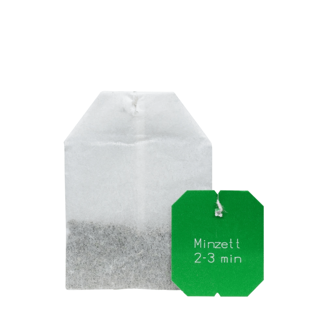 Salus Minzett Bio-Kräutertee – ungeöffneter Teebeutel mit grünem Anhänger und Aufgusszeit