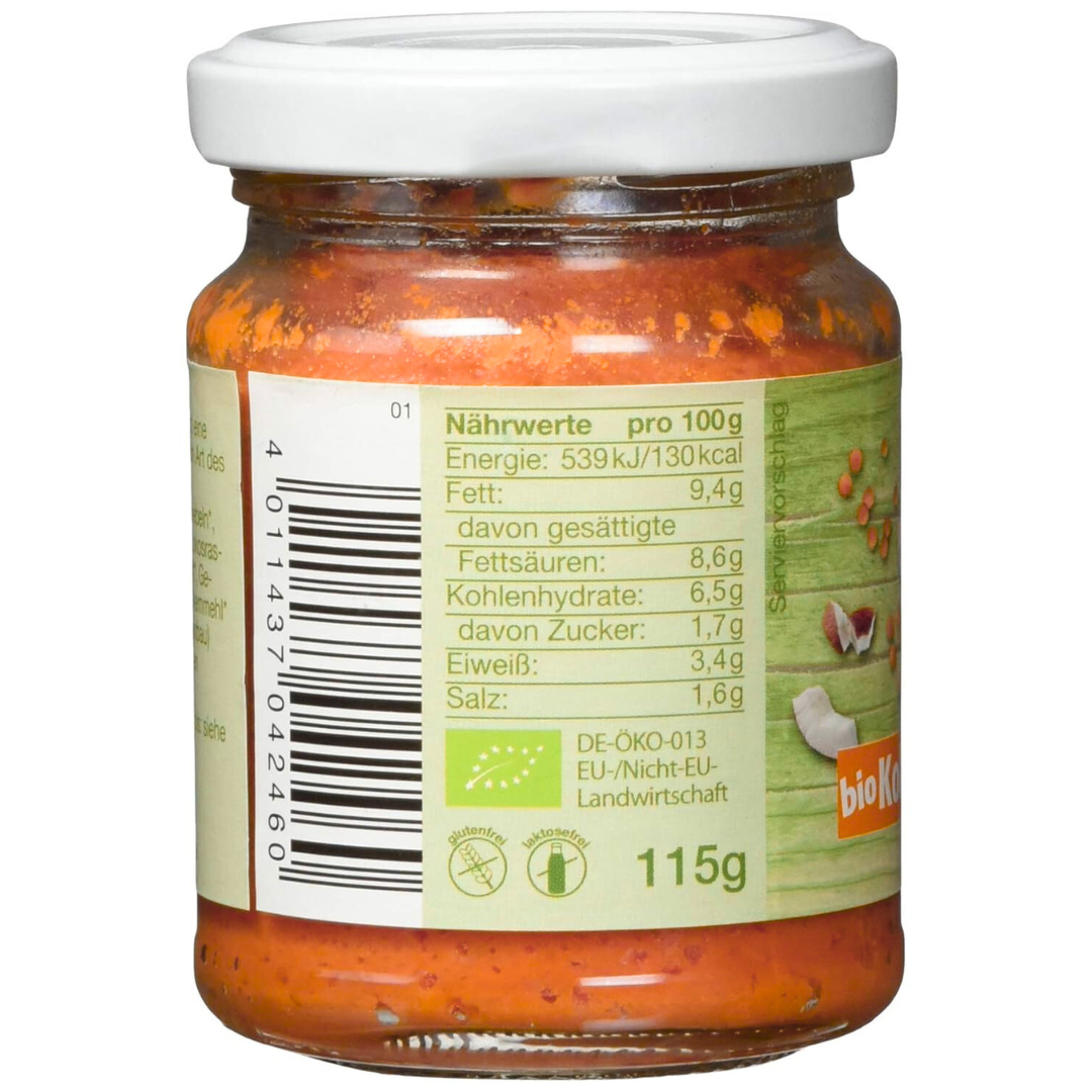 VITAM Kokos-Linsen-Hummus Bio vegan Brotaufstrich 115g Nährwertangaben – Rückseite des Glases mit Nährwerttabelle, Bio-Siegel und Angaben zu Inhaltsstoffen des VITAM Kokos-Linsen-Hummus.
