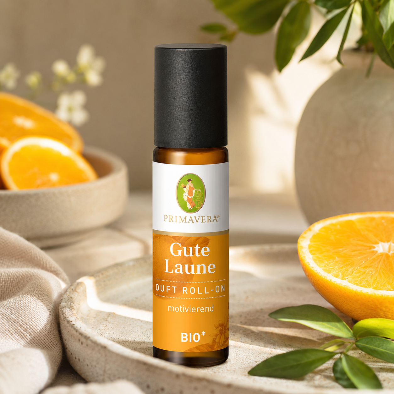 PRIMAVERA Gute Laune Duft Roll-On bio 10 ml in natürlicher Wellness-Umgebung mit frischer Orange
