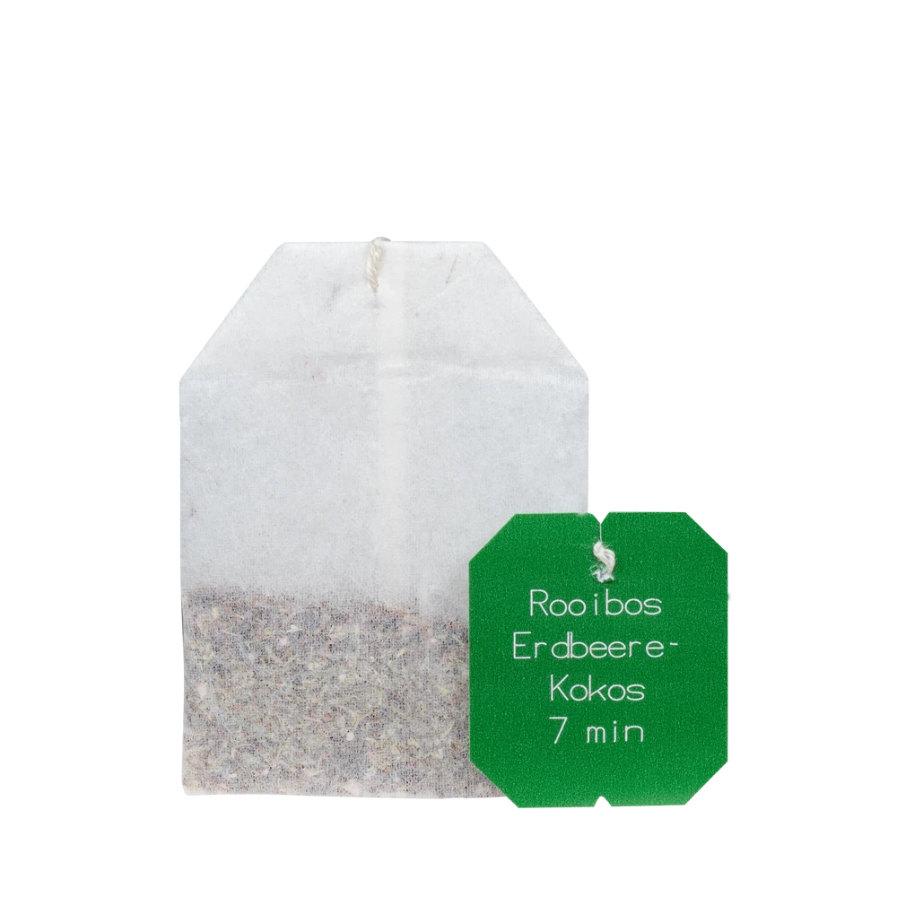 Salus Rooibos Erdbeere-Kokos Tee Bio – offener Teebeutel mit grünem Anhänger und Aufschrift 7 Minuten Ziehzeit