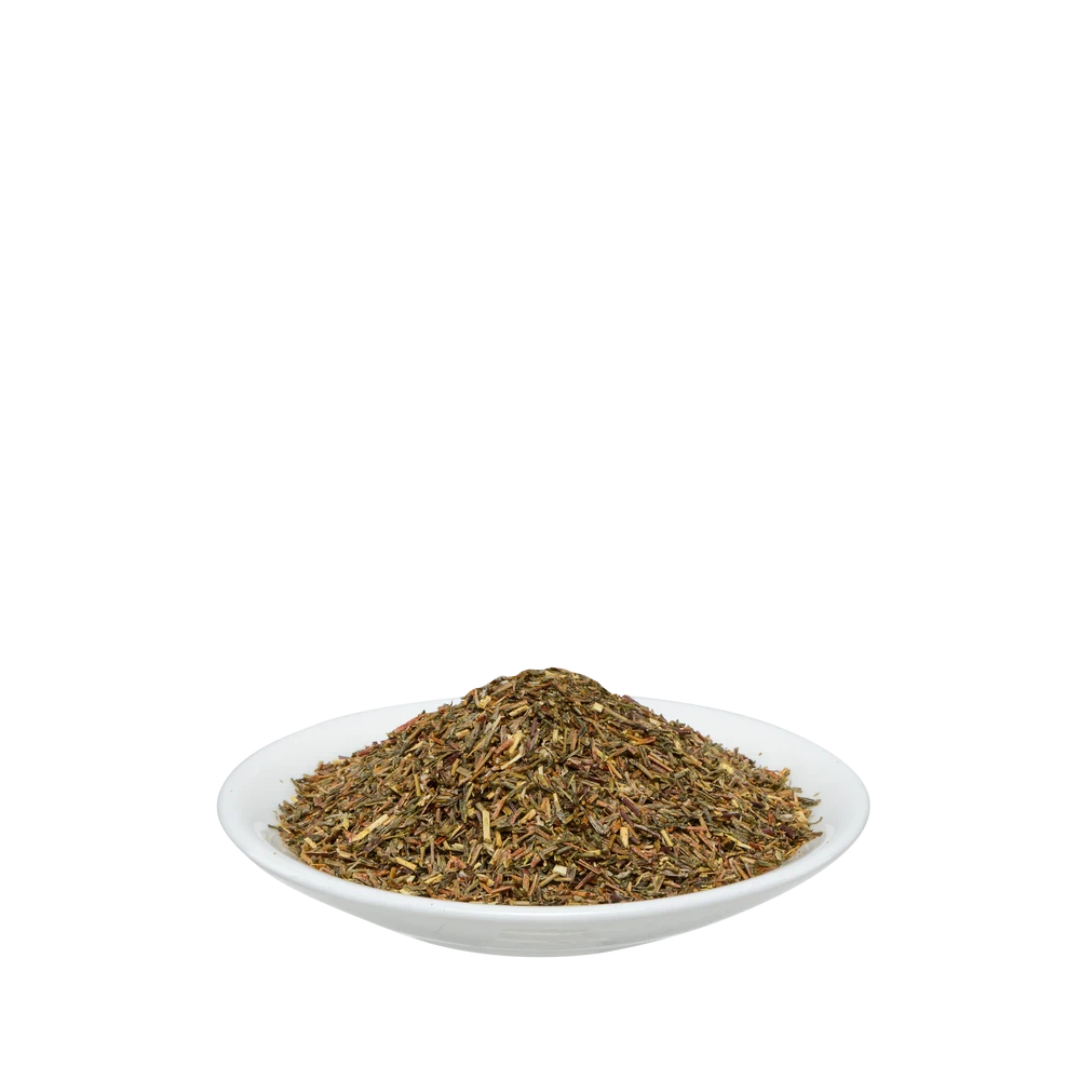Grüner Rooibos Natur Bio loser Tee von Salus auf weißem Teller