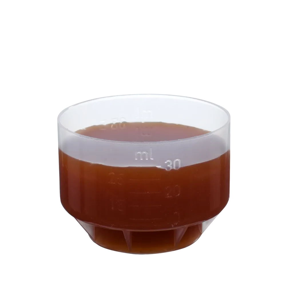 Dosierbecher mit 30 ml Salusan Ortho Bio-Hagebutten-Tonikum von Salus