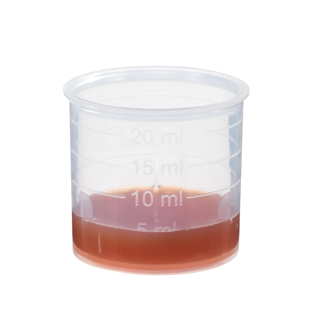 Dosierbecher mit 15ml Schoenenberger Granatapfel Saft Bio Muttersaft