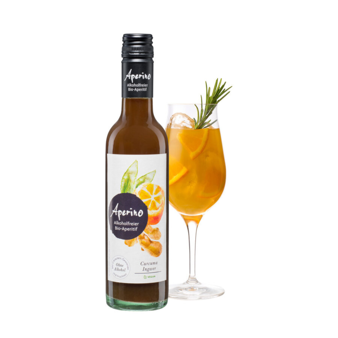 Aperino alkoholfreier Bio-Aperitif 370 ml – Curcuma-Ingwer-Drink, serviert im Glas mit Eis und Orangenscheiben
