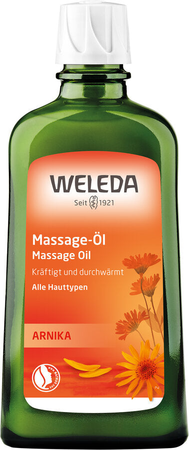 Weleda Arnika Massage-Öl in einer grünen Flasche mit weißem Verschluss und orangefarbenem Etikett.