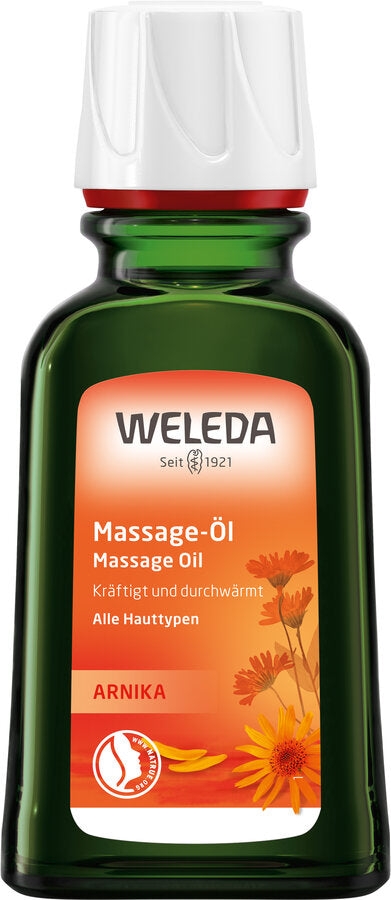 Weleda Arnika Massage-Öl in einer grünen Flasche mit weißem Verschluss und orangefarbenem Etikett.