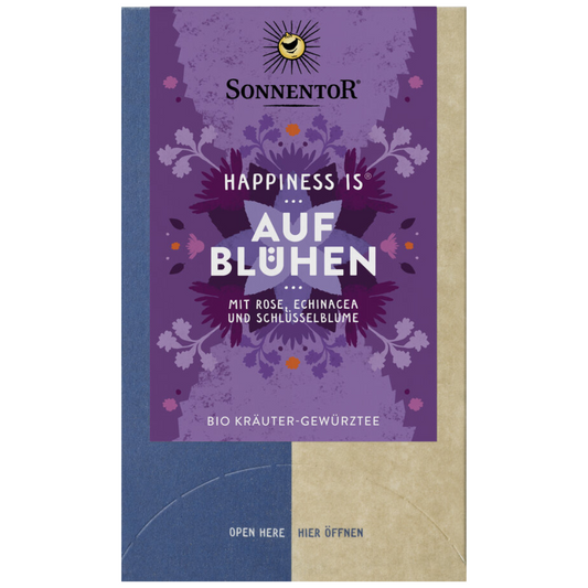 Sonnentor Happiness is Aufblühen Bio Kräuter-Gewürztee mit Rose, Echinacea und Schlüsselblume in dekorativer lila Verpackung