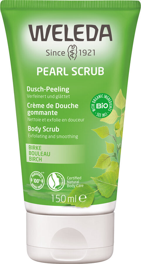 Das Bild zeigt eine Tube des Weleda Perl-Scrubs, einem Körperpeeling mit Birke. Die grüne Tube zeigt prominent das Weleda-Logo und den Produktnamen. Das Etikett beschreibt das Produkt als ein "Dusch-Peeling", das sanft reinigt und abschält. Es ist zertifizierte, natürliche Körperpflege.