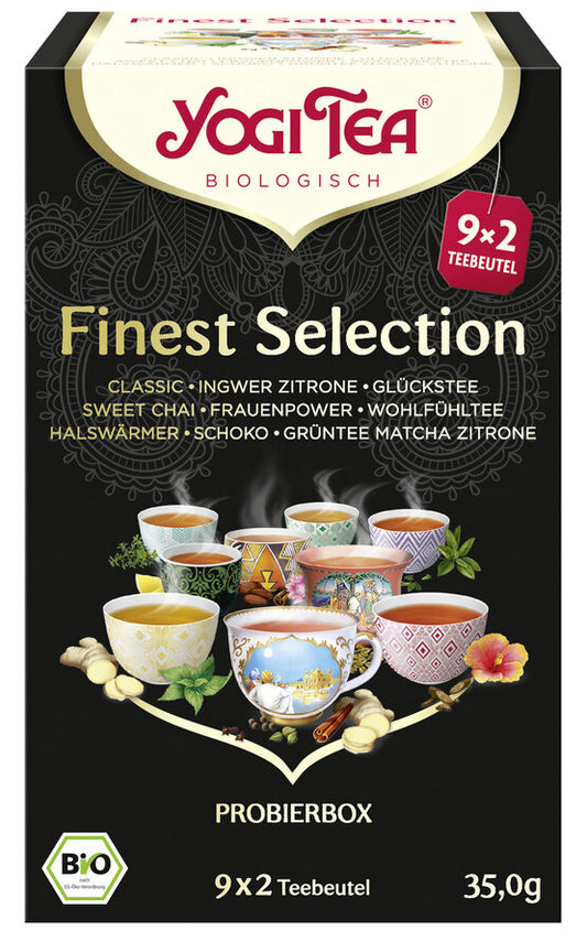 Eine Packung der 'Finest Selection' Probierbox von Yogi Tea. Die Verpackung ist schwarz und zeigt eine Illustration von neun Teetassen mit unterschiedlichen Mustern, die verschiedene Teesorten repräsentieren. Oben steht in roter Schrift 'Yogi Tea' und darunter 'Biologisch'. Die Probierbox enthält die Sorten Classic, Ingwer Zitrone, Glückstee, Sweet Chai, Frauenpower, Wohlfühltee, Halswärmer, Schoko, Grüntee Matcha Zitrone. Unten steht 'Probierbox' und die Information '9 x 2 Teebeutel', insgesamt 35,0 g.