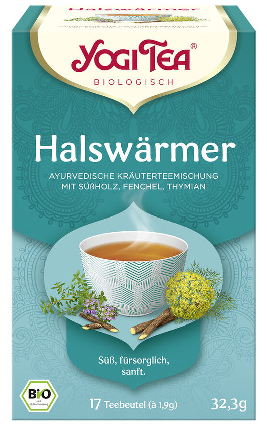 Eine Packung des 'Halswärmer' Tees von Yogi Tea. Die Verpackung ist türkis und zeigt eine Illustration einer Tasse Tee mit einem geometrischen Muster, umgeben von Süßholzwurzeln, Fenchel und Thymian. Oben steht in roter Schrift 'Yogi Tea' und darunter 'Biologisch'. Die Teesorte ist als 'Ayurvedische Kräuterteemischung mit Süßholz, Fenchel, Thymian' beschrieben. Unten steht 'Süß, fürsorglich, sanft'. Es sind 17 Teebeutel à 1,9 g enthalten, insgesamt 32,3 g. Unten links ist das Bio-Siegel abgebildet.