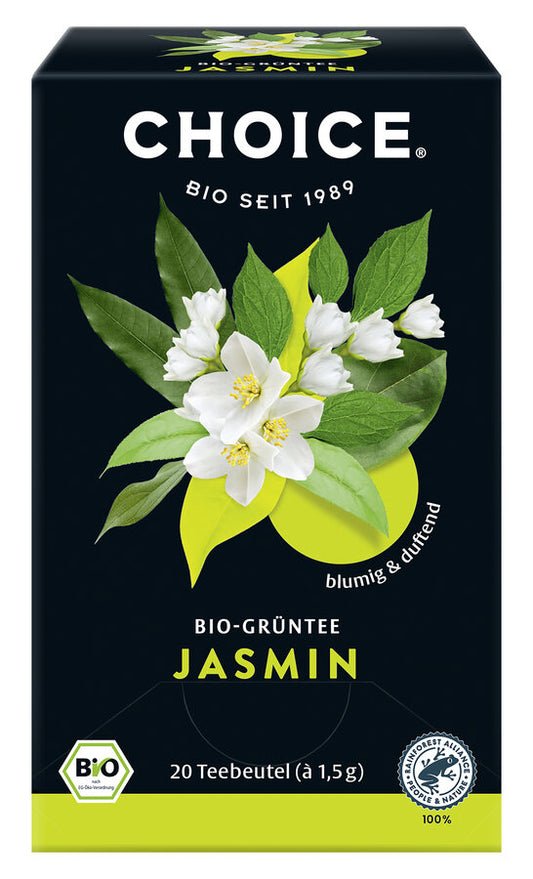 Eine Packung des Bio-Grüntees 'Jasmin' der Marke Choice. Die Verpackung ist schwarz mit einem großen Bild von Jasminblüten und grünen Blättern. Oben steht in weißer Schrift 'Choice' und darunter 'Bio seit 1989'. Unten steht 'Bio-Grüntee Jasmin' in gelber Schrift. Es sind 20 Teebeutel à 1,5 g enthalten. Das Produkt ist als blumig und duftend beschrieben und trägt das Bio-Siegel sowie das Rainforest Alliance Zertifikat.