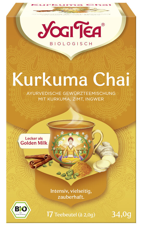 Eine Packung des 'Kurkuma Chai' Tees von Yogi Tea. Die Verpackung ist goldfarben und zeigt eine Illustration einer Tasse Tee mit einem meditativen Motiv, umgeben von Kurkuma, Zimtstangen und Ingwer. Oben steht in roter Schrift 'Yogi Tea' und darunter 'Biologisch'. Die Teesorte ist als 'Ayurvedische Gewürzteemischung mit Kurkuma, Zimt, Ingwer' beschrieben. Ein rotes Feld weist darauf hin, dass der Tee 'Lecker als Golden Milk' ist. Unten steht 'Intensiv, vielseitig, zauberhaft'.