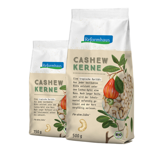 Reformhaus Bio Cashewkerne in zwei Größen: 150 g und 500 g Packung mit Illustration des Cashewapfels