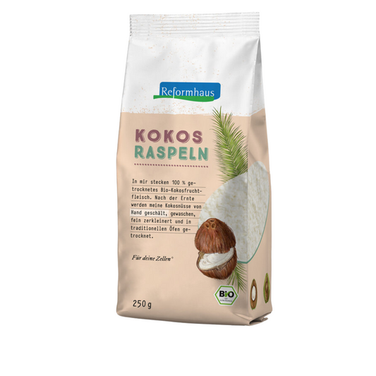 Frontansicht der Reformhaus Bio Kokosraspeln 250 g – 100 % getrocknetes Kokosfruchtfleisch, handverarbeitet und in traditionellen Öfen getrocknet.