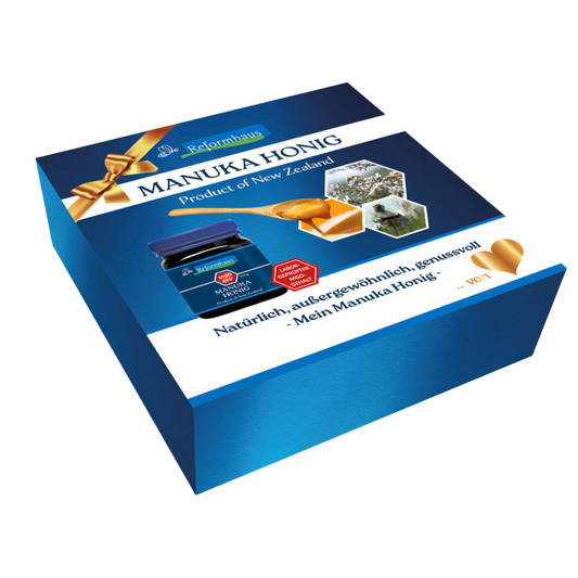 Geschenkverpackung des Reformhaus Manuka Honigs MGO 460+ mit Honigglas, Löffel und Naturmotiven – ideal zum Verschenken