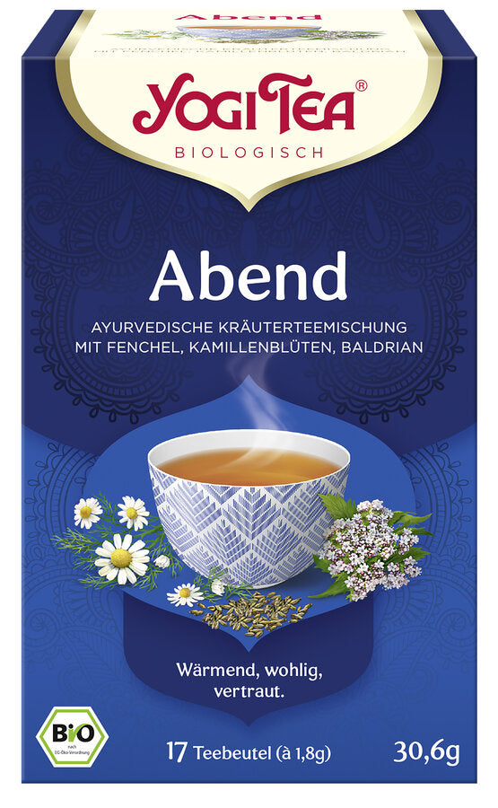 Eine Packung "Yogi Tea Abend" von der Marke Yogi Tea. Auf der Vorderseite der Packung steht "Abend" und "Ayurvedische Kräuterteemischung mit Fenchel, Kamillenblüten, Baldrian". Das Etikett zeigt eine dampfende Tasse Tee, umgeben von Kamillenblüten, Fenchelsamen und Baldrianpflanzen. Unten auf der Packung steht "Wärmend, wohlig, vertraut". Die Packung enthält 17 Teebeutel mit jeweils 1,8 g Tee, insgesamt 30,6 g. Der Tee ist ein Bio-Produkt, wie durch das Bio-Siegel unten links angezeigt wird.