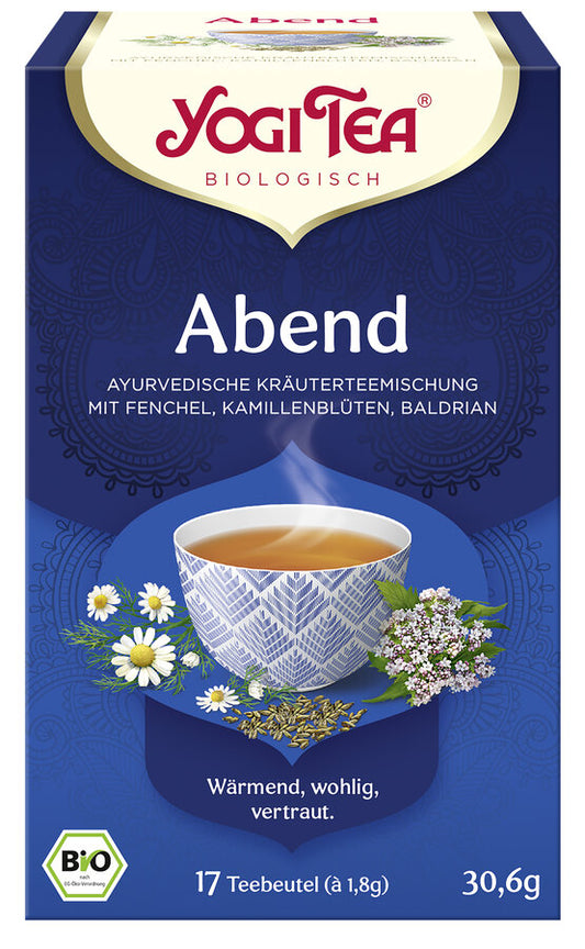 Eine Packung "Yogi Tea Abend" von der Marke Yogi Tea. Auf der Vorderseite der Packung steht "Abend" und "Ayurvedische Kräuterteemischung mit Fenchel, Kamillenblüten, Baldrian". Das Etikett zeigt eine dampfende Tasse Tee, umgeben von Kamillenblüten, Fenchelsamen und Baldrianpflanzen. Unten auf der Packung steht "Wärmend, wohlig, vertraut". Die Packung enthält 17 Teebeutel mit jeweils 1,8 g Tee, insgesamt 30,6 g. Der Tee ist ein Bio-Produkt, wie durch das Bio-Siegel unten links angezeigt wird.