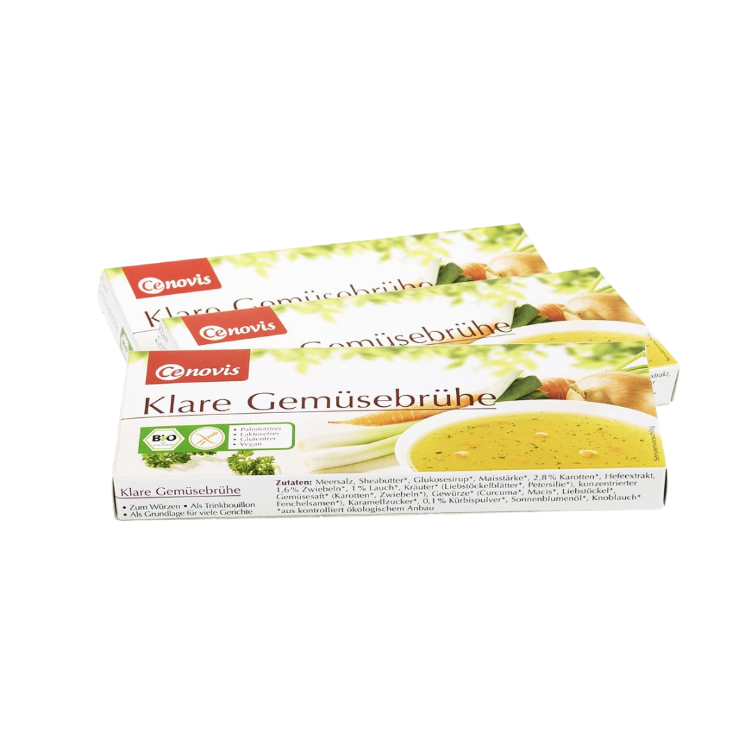 Drei gestapelte Packungen Cenovis Klare Gemüsebrühe Bio mit natürlichem Design