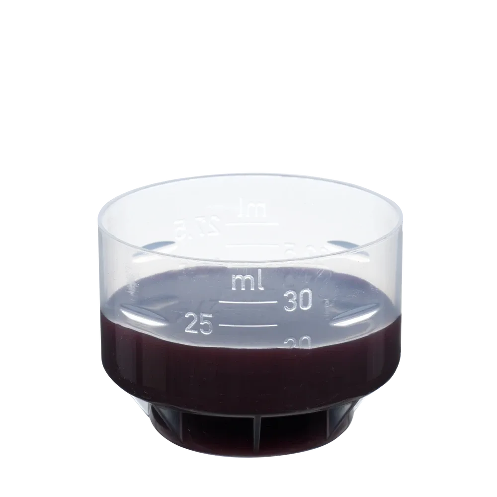 Messbecher mit Salus Protecor Herz-Aktiv Tonikum – Dosierung 20 ml bis 30 ml