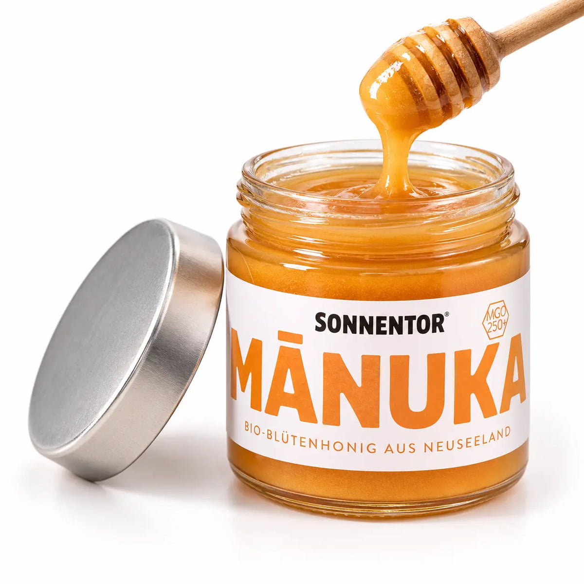 Sonnentor Manukahonig MGO 250+ mit Honiglöffel und cremigem Manuka Honig
