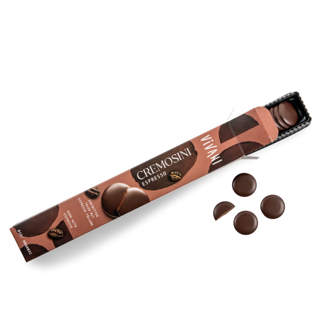 Vivani Cremosini Espresso Bio 100 g geöffnete Verpackung mit Zartbitter-Schokoladentalern und Espresso-Füllung